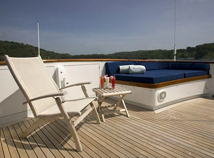 a boat on a deck aboard MAVERICK Yacht for Charter