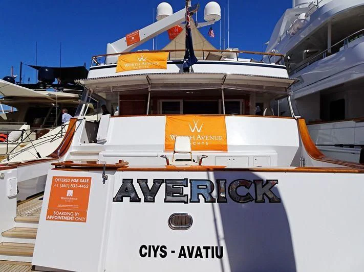 a boat with a sign on the front aboard MAVERICK Yacht for Charter