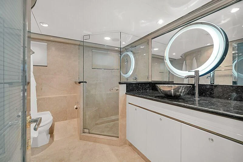 a bathroom with a large mirror aboard MAVERICK Yacht for Charter