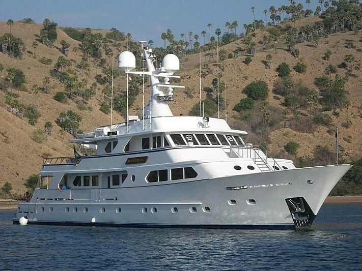 a white boat on the water aboard MAVERICK Yacht for Charter