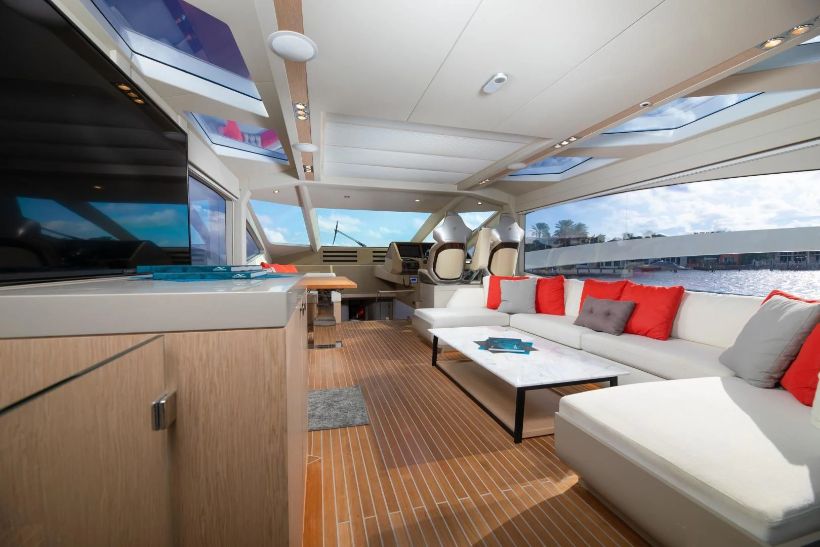 a room with a couch and a table aboard ADONIS Yacht for Sale