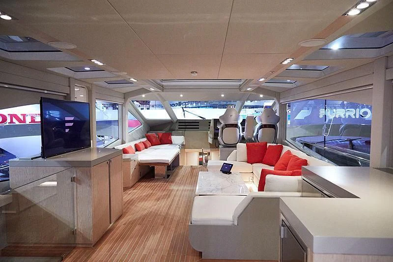 a room with a couch and a tv aboard ADONIS Yacht for Sale