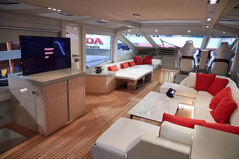 a room with a large screen aboard ADONIS Yacht for Sale