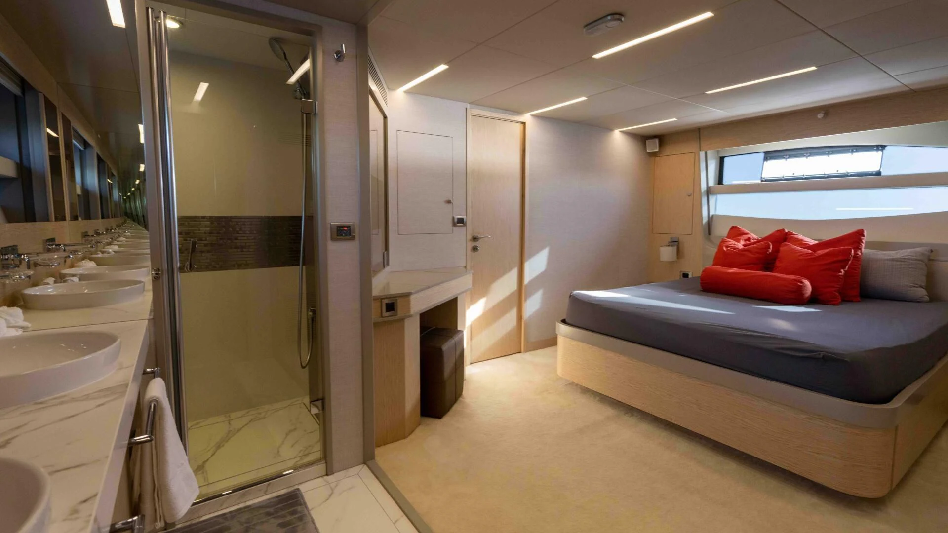 a room with a bed and a sink aboard ADONIS Yacht for Sale