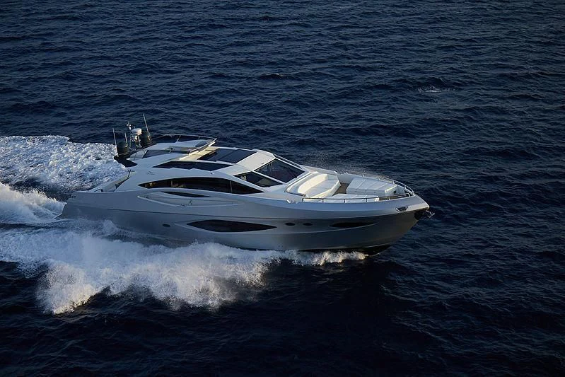 a white boat on the water aboard ADONIS Yacht for Sale
