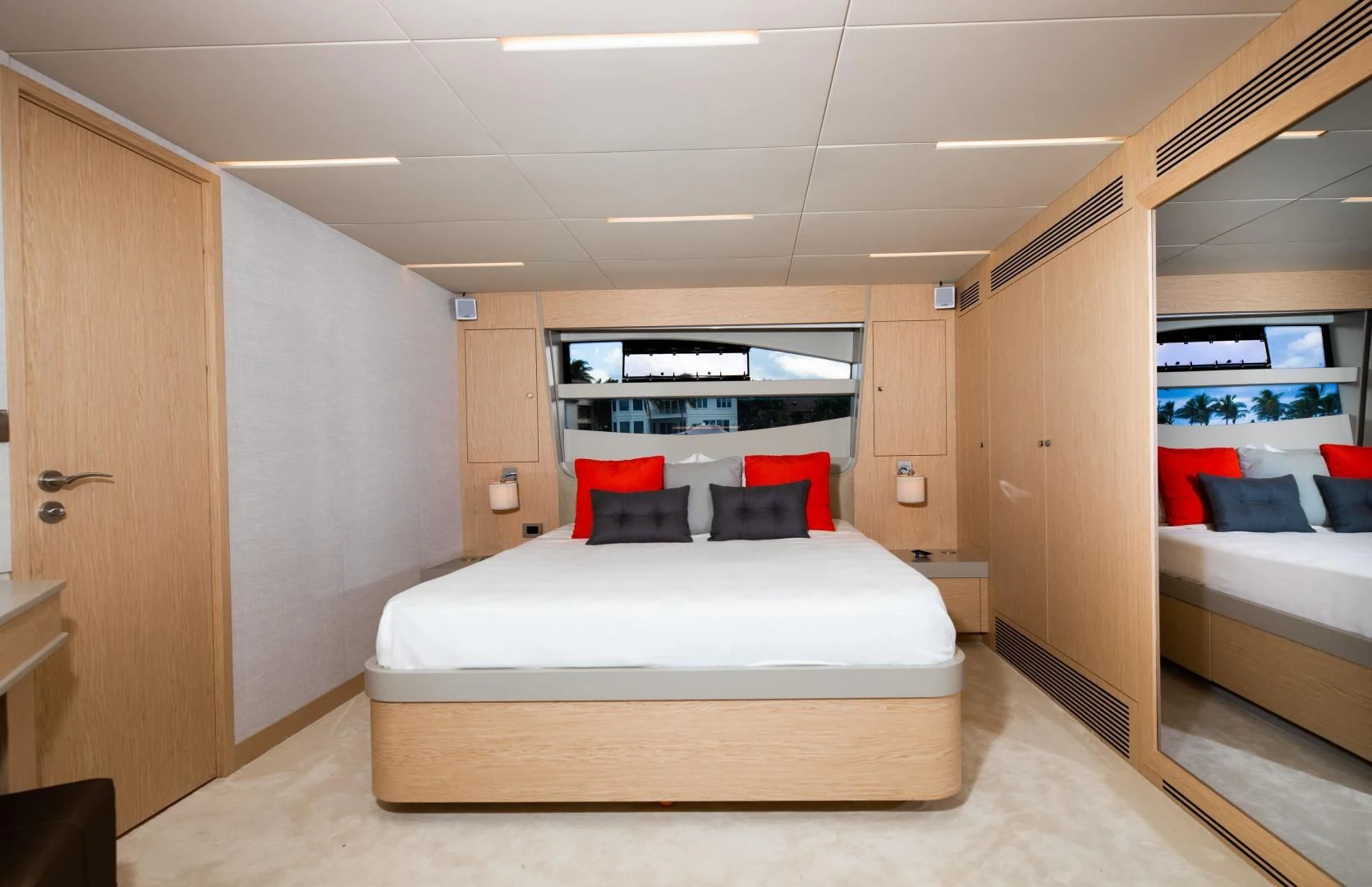 a room with a bed and a desk aboard ADONIS Yacht for Sale