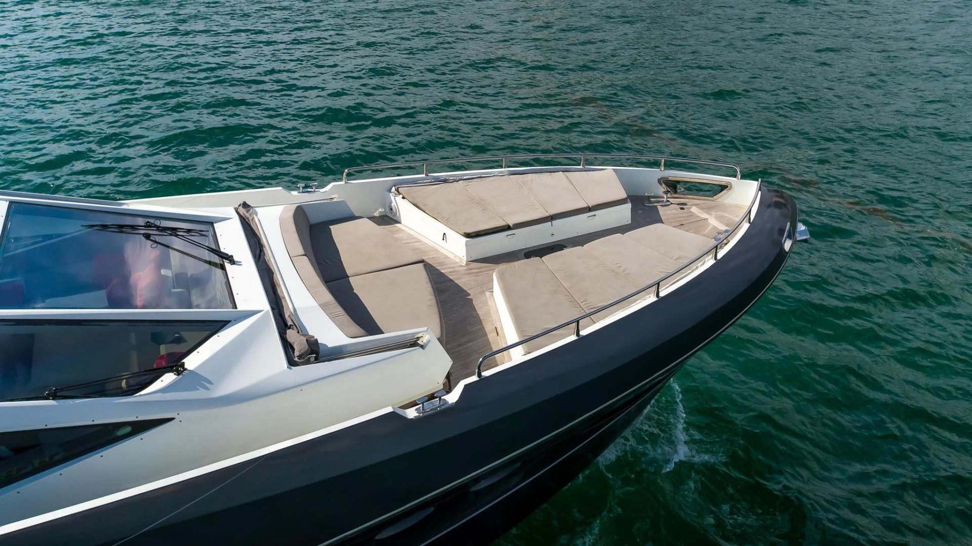 a person driving a boat aboard ADONIS Yacht for Sale