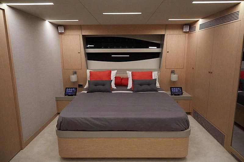 a bed in a room aboard ADONIS Yacht for Sale