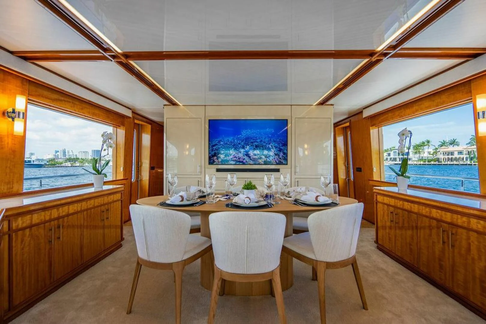 a dining room with a table and chairs aboard CARPE DIEM Yacht for Charter