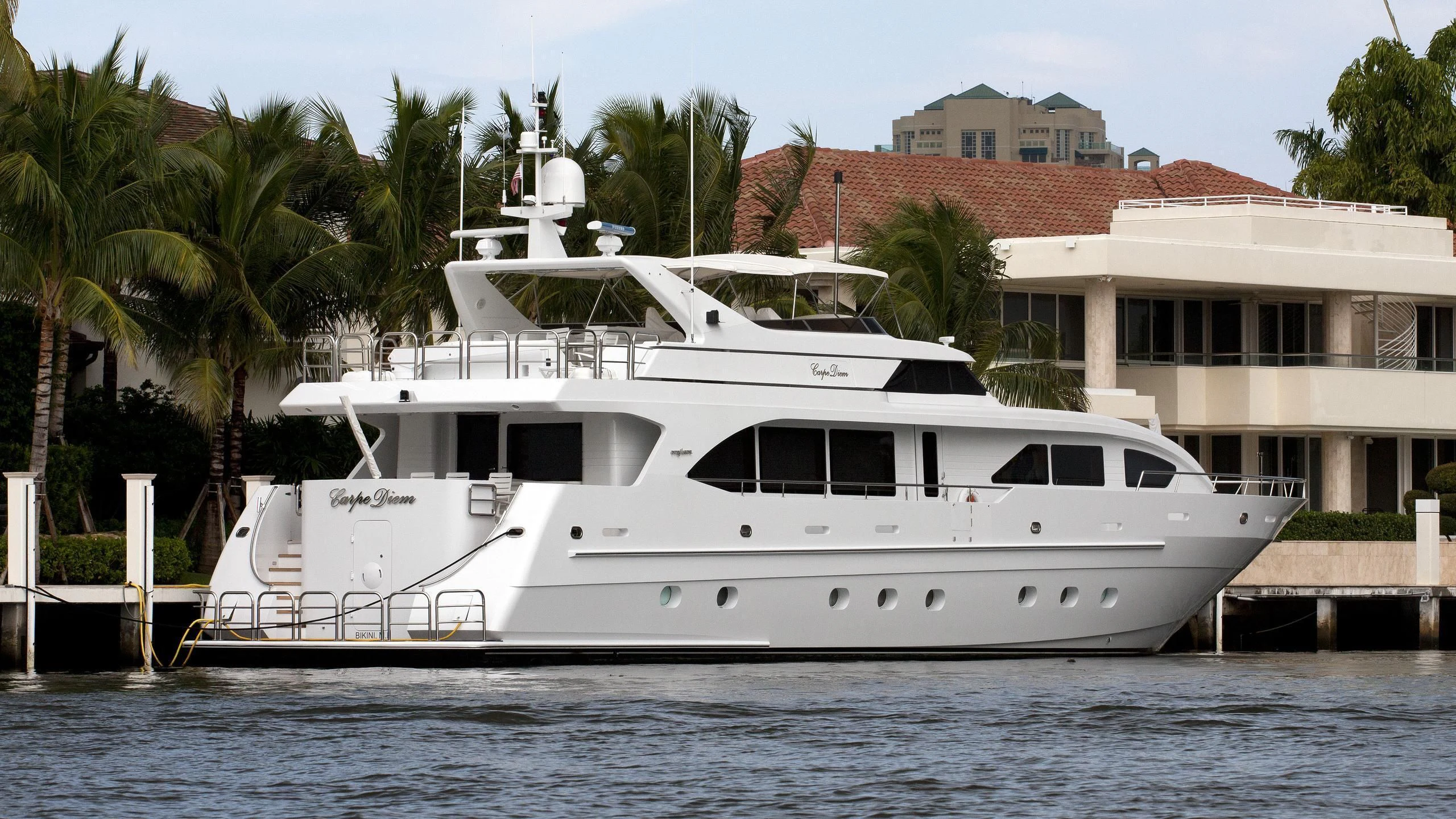 a white boat in the water aboard CARPE DIEM Yacht for Charter