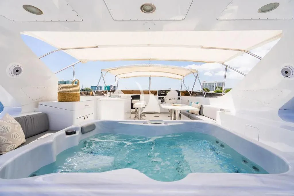 a pool with a large white tent aboard CARPE DIEM Yacht for Charter