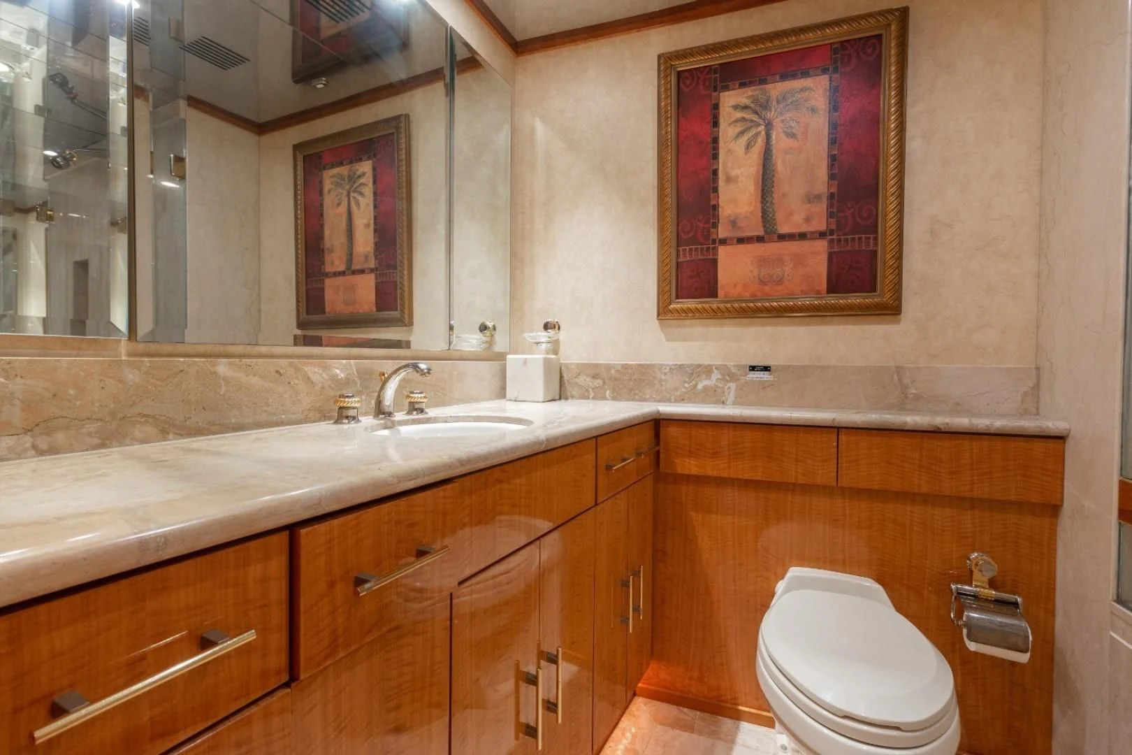 a bathroom with a toilet and sink aboard CARPE DIEM Yacht for Charter