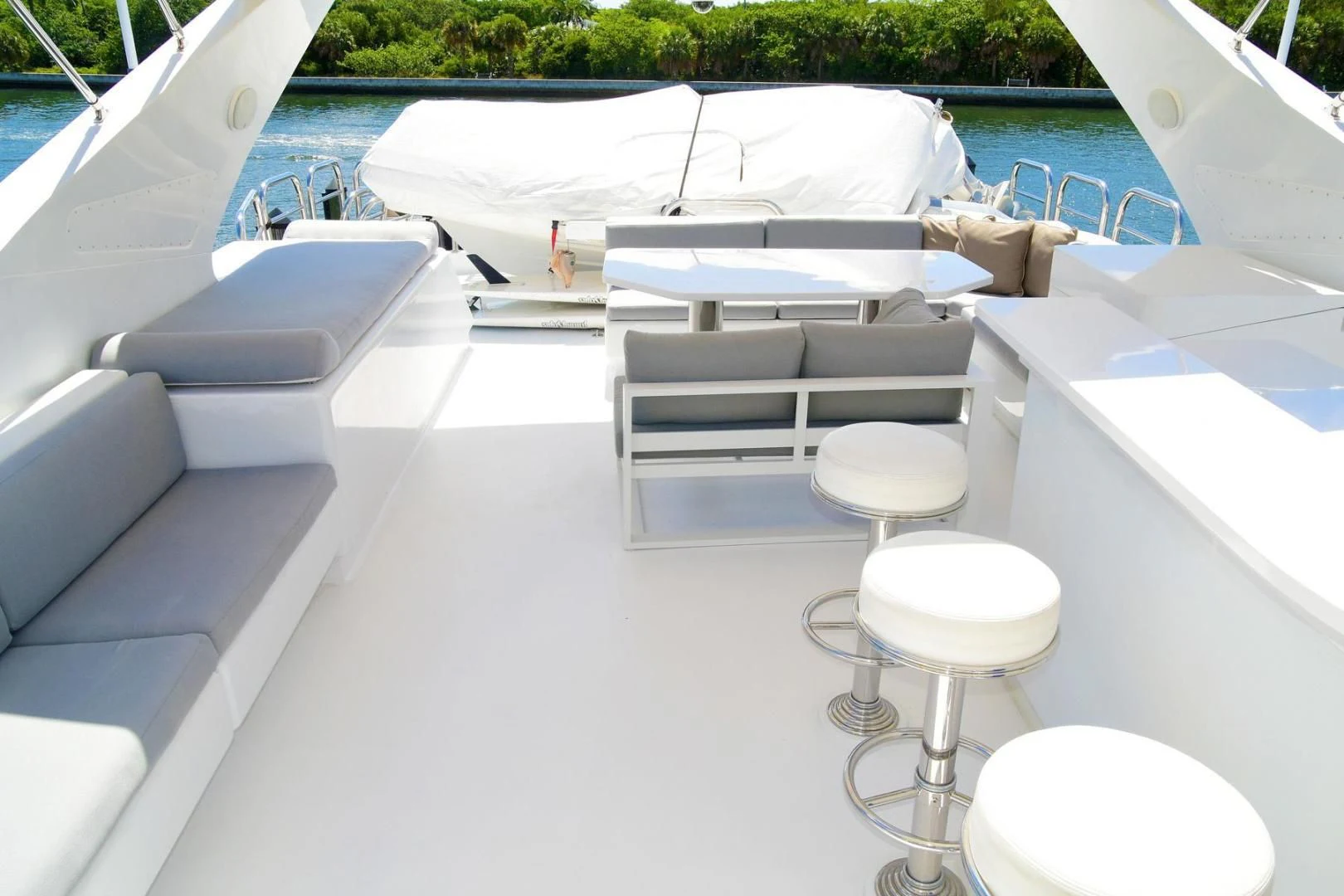 a pool with a table and chairs aboard CARPE DIEM Yacht for Charter