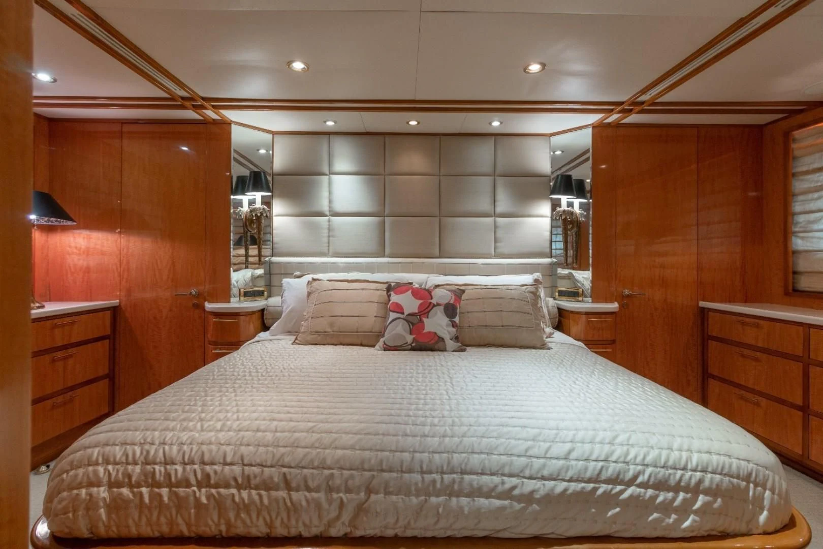 a bed with pillows aboard CARPE DIEM Yacht for Charter