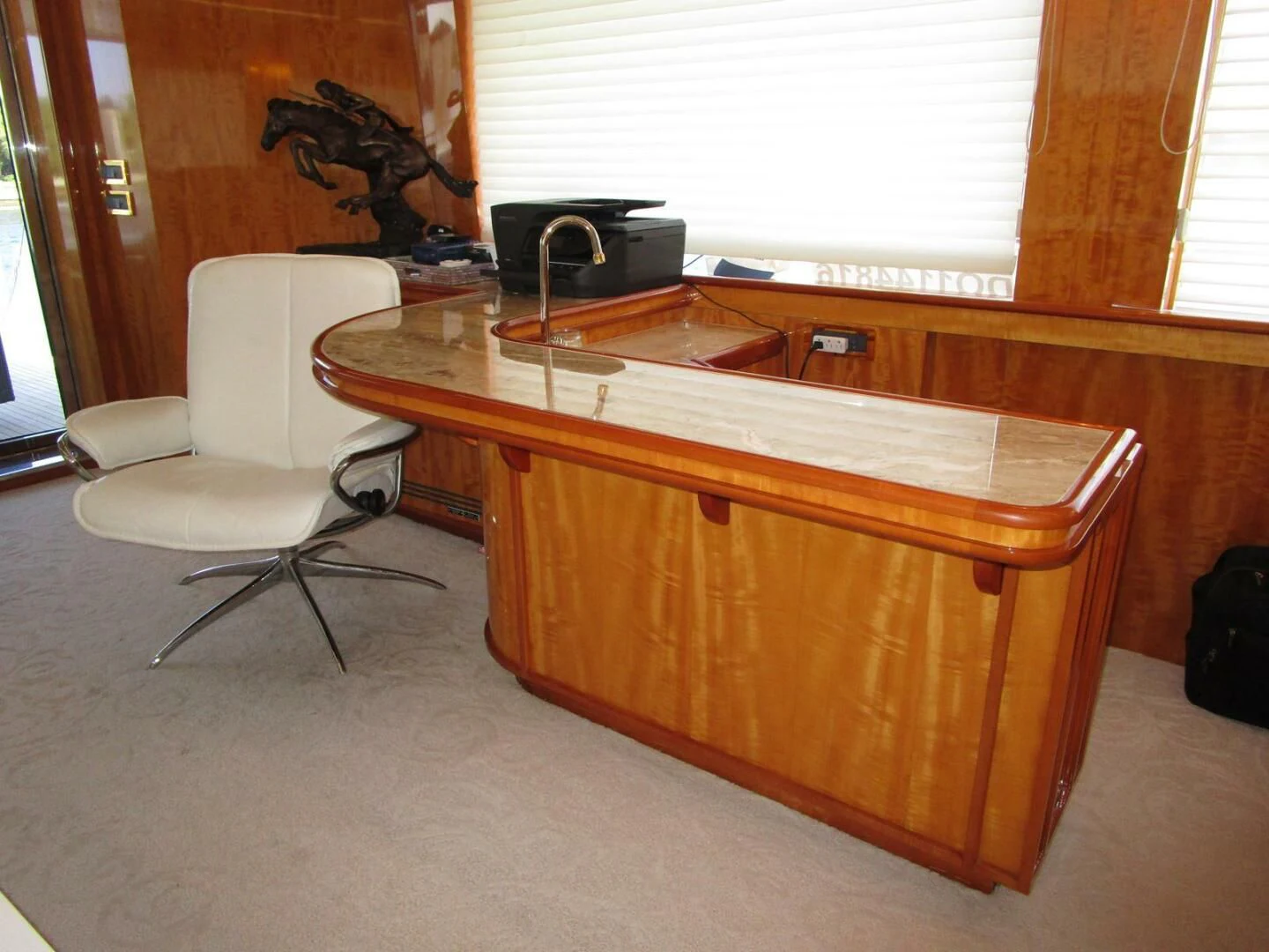 a desk with a chair and a chair aboard CARPE DIEM Yacht for Charter