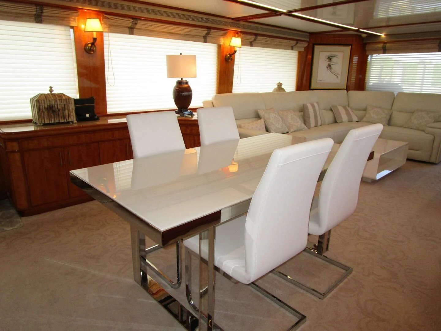 a living room with a couch and a coffee table aboard CARPE DIEM Yacht for Charter