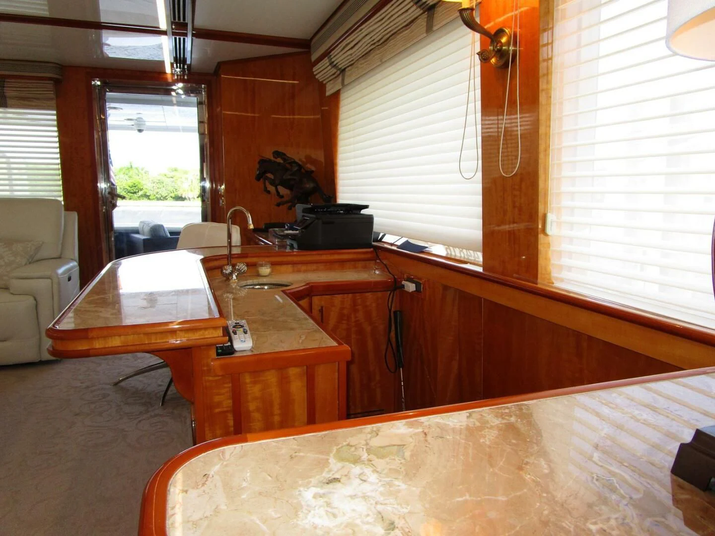 a room with a table and chairs aboard CARPE DIEM Yacht for Charter