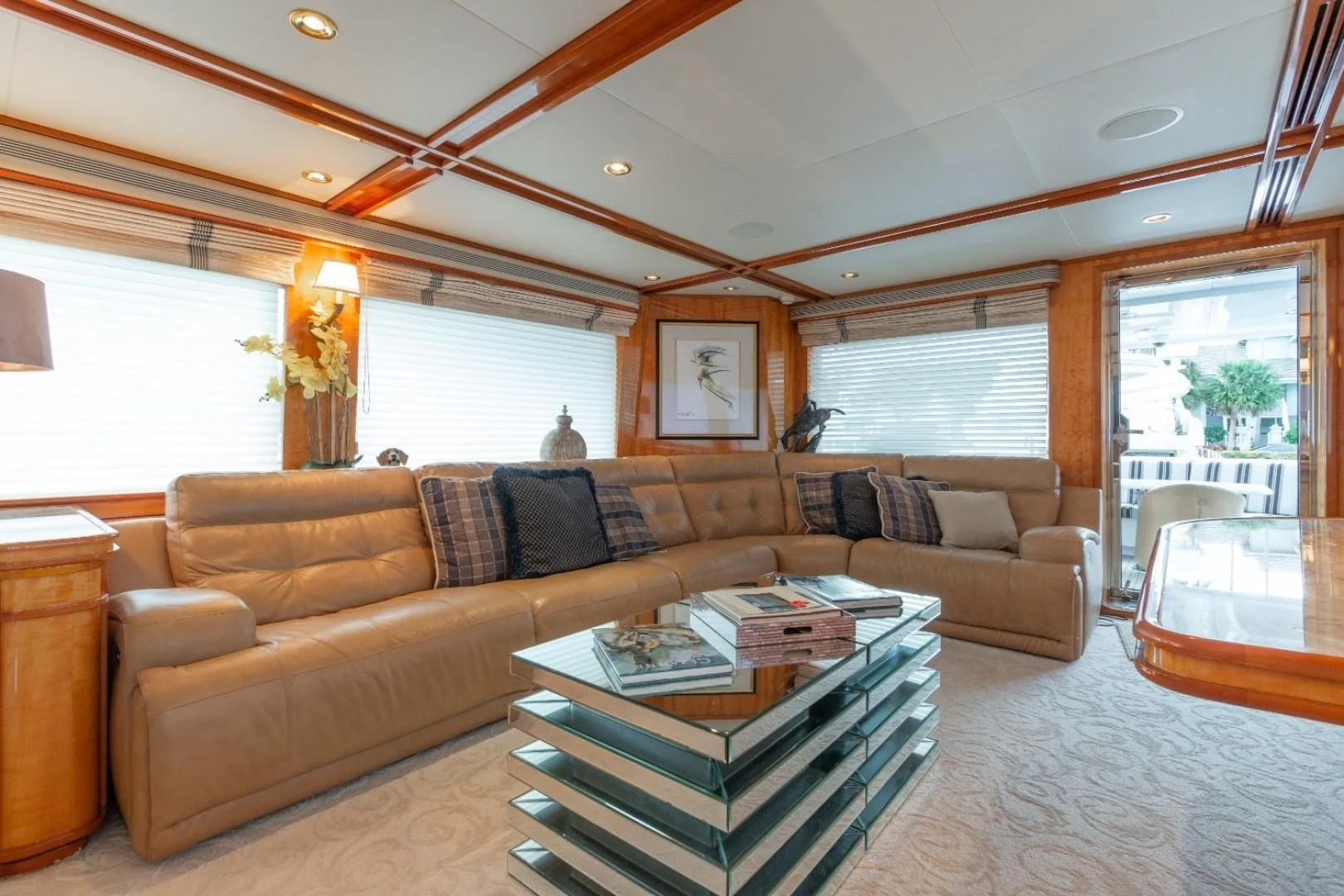 a living room with a couch and a coffee table aboard CARPE DIEM Yacht for Charter