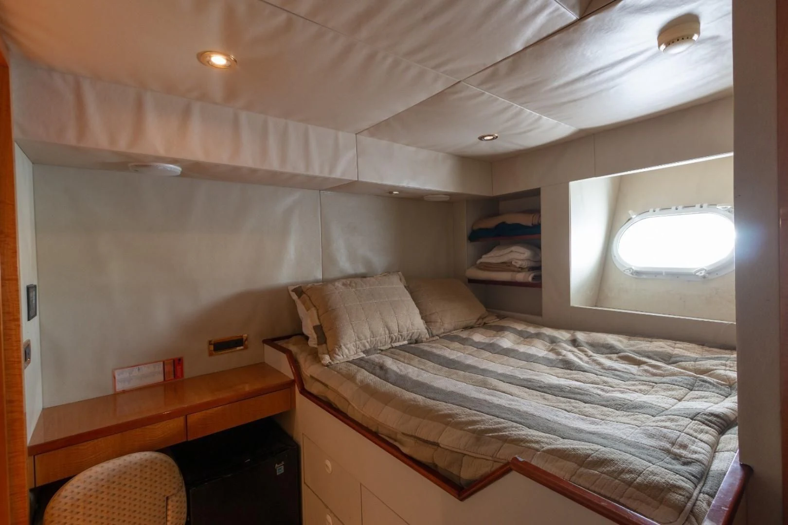 a bed in a room aboard CARPE DIEM Yacht for Charter