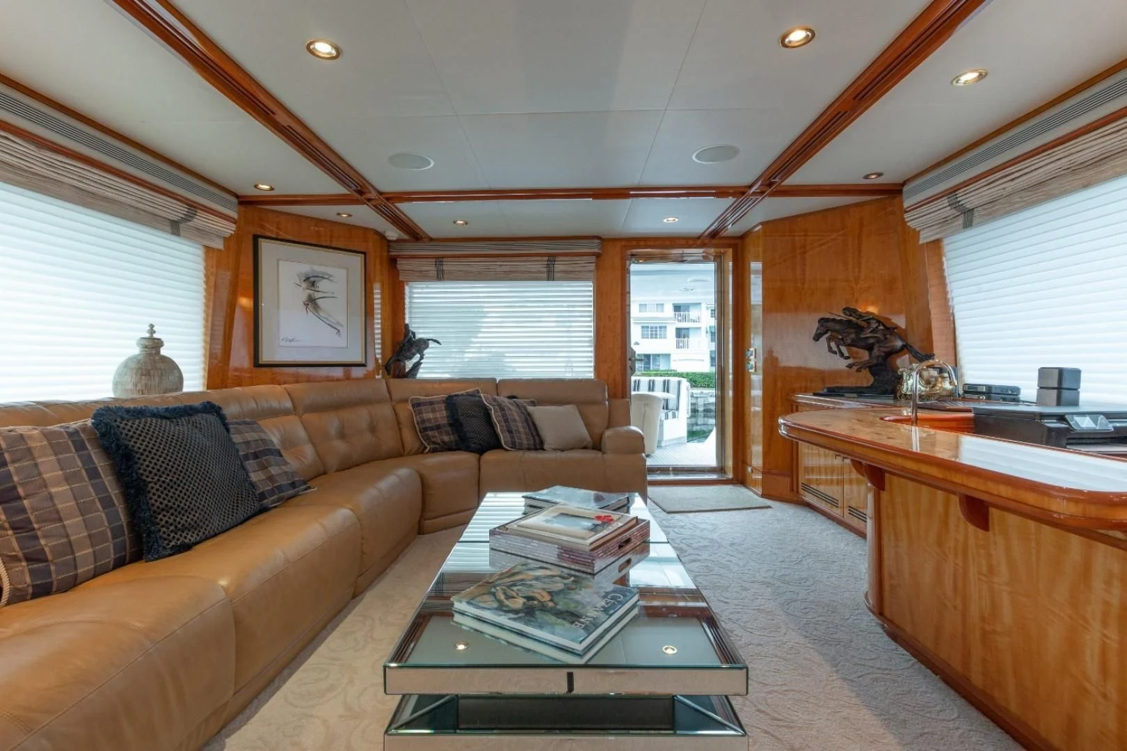 a living room with a couch and a coffee table aboard CARPE DIEM Yacht for Charter