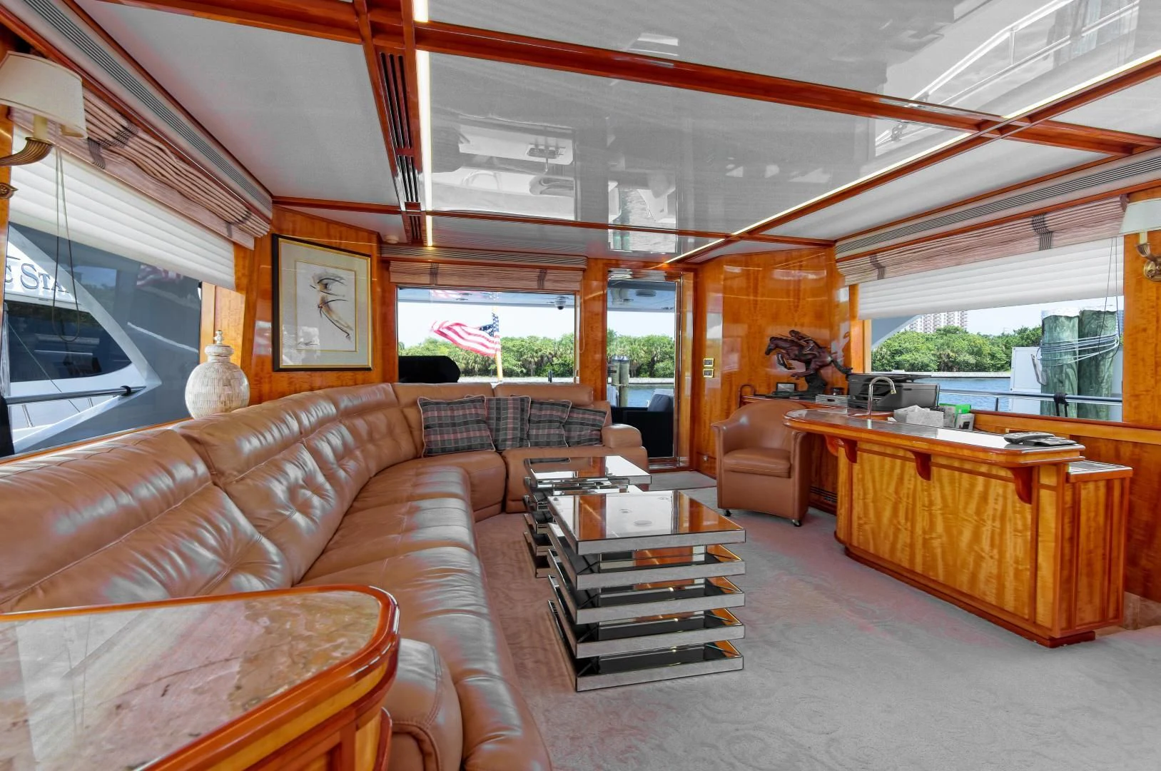 a living room with a couch and a coffee table aboard CARPE DIEM Yacht for Charter