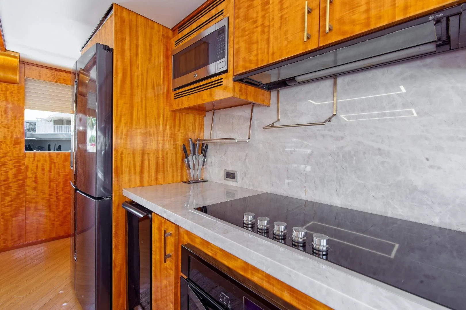 a kitchen with a stainless steel sink aboard CARPE DIEM Yacht for Charter