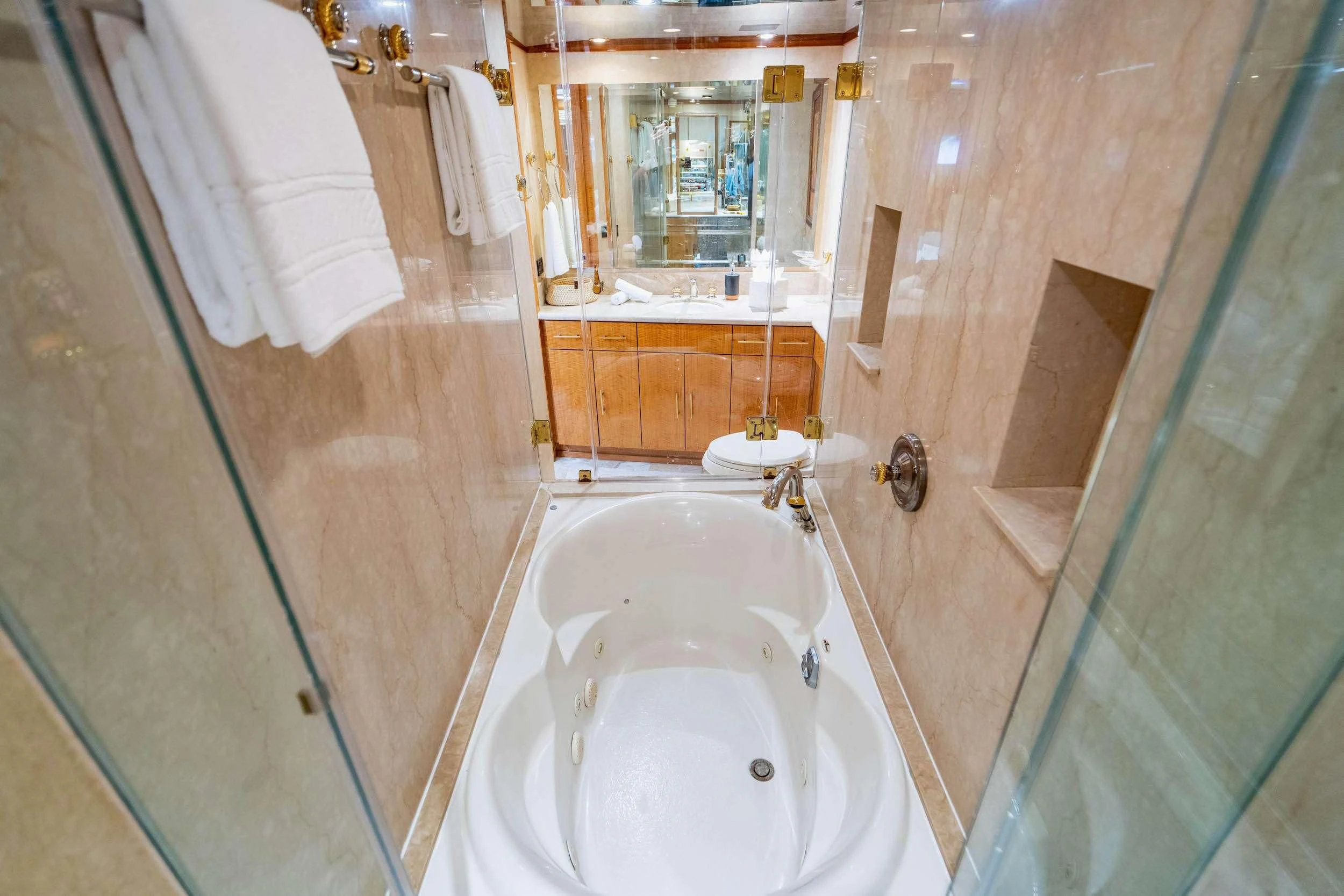 a bathroom with a sink and shower aboard CARPE DIEM Yacht for Charter