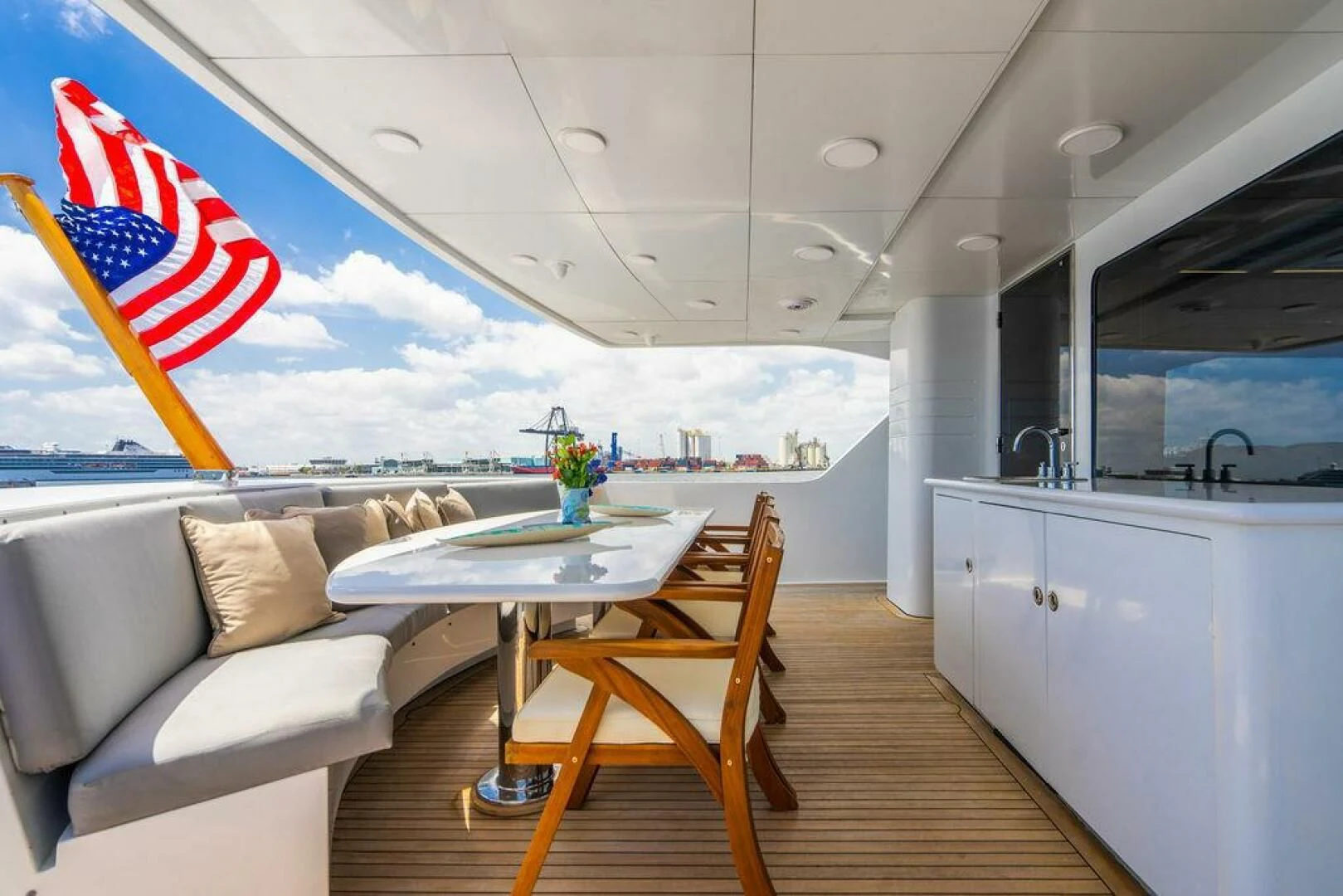 a table and chairs on a deck aboard CARPE DIEM Yacht for Charter