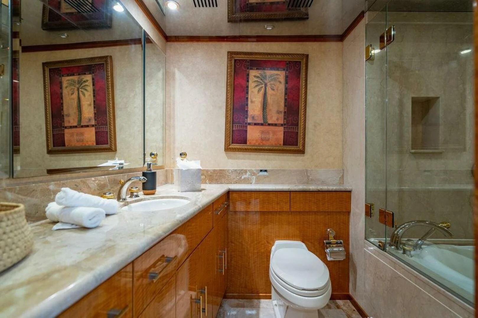 a bathroom with a sink toilet and bathtub aboard CARPE DIEM Yacht for Charter