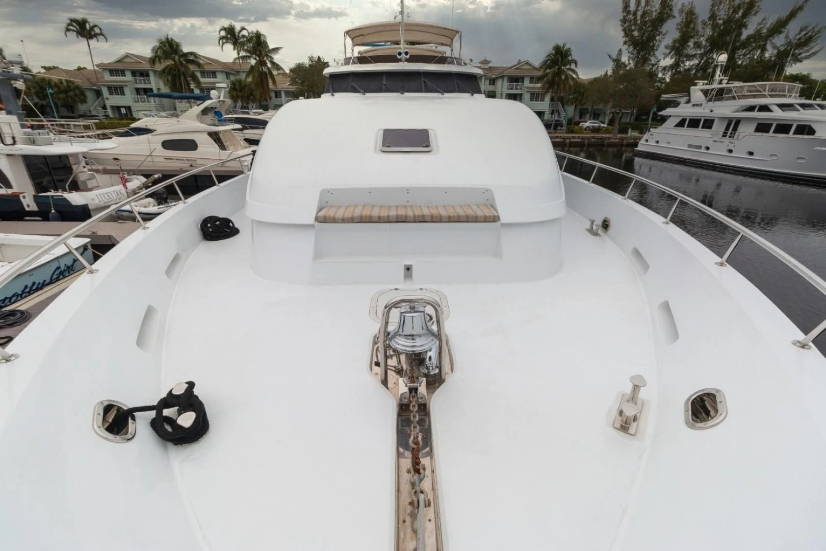 a white boat with a gold neck aboard CARPE DIEM Yacht for Charter