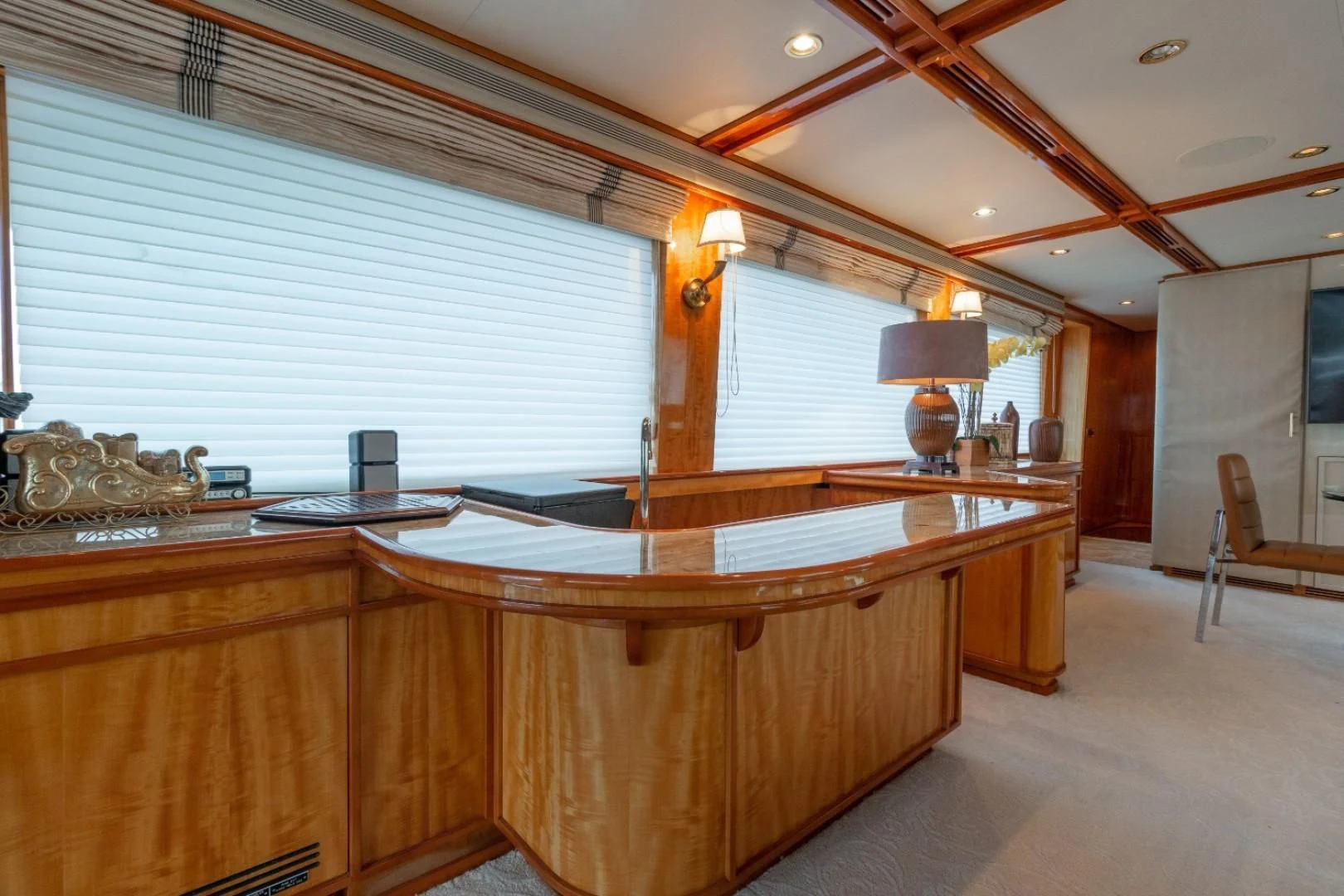 a large wooden desk in a room aboard CARPE DIEM Yacht for Charter