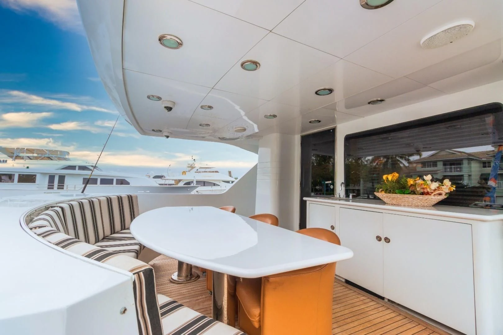 a room with a table and chairs aboard CARPE DIEM Yacht for Charter