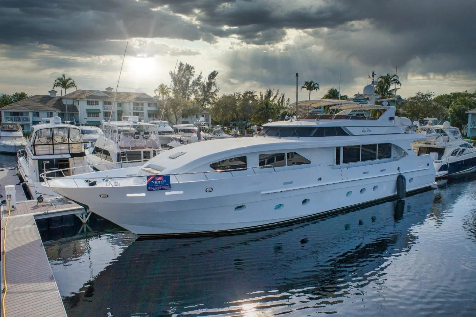 a group of boats are parked in a harbor aboard CARPE DIEM Yacht for Charter