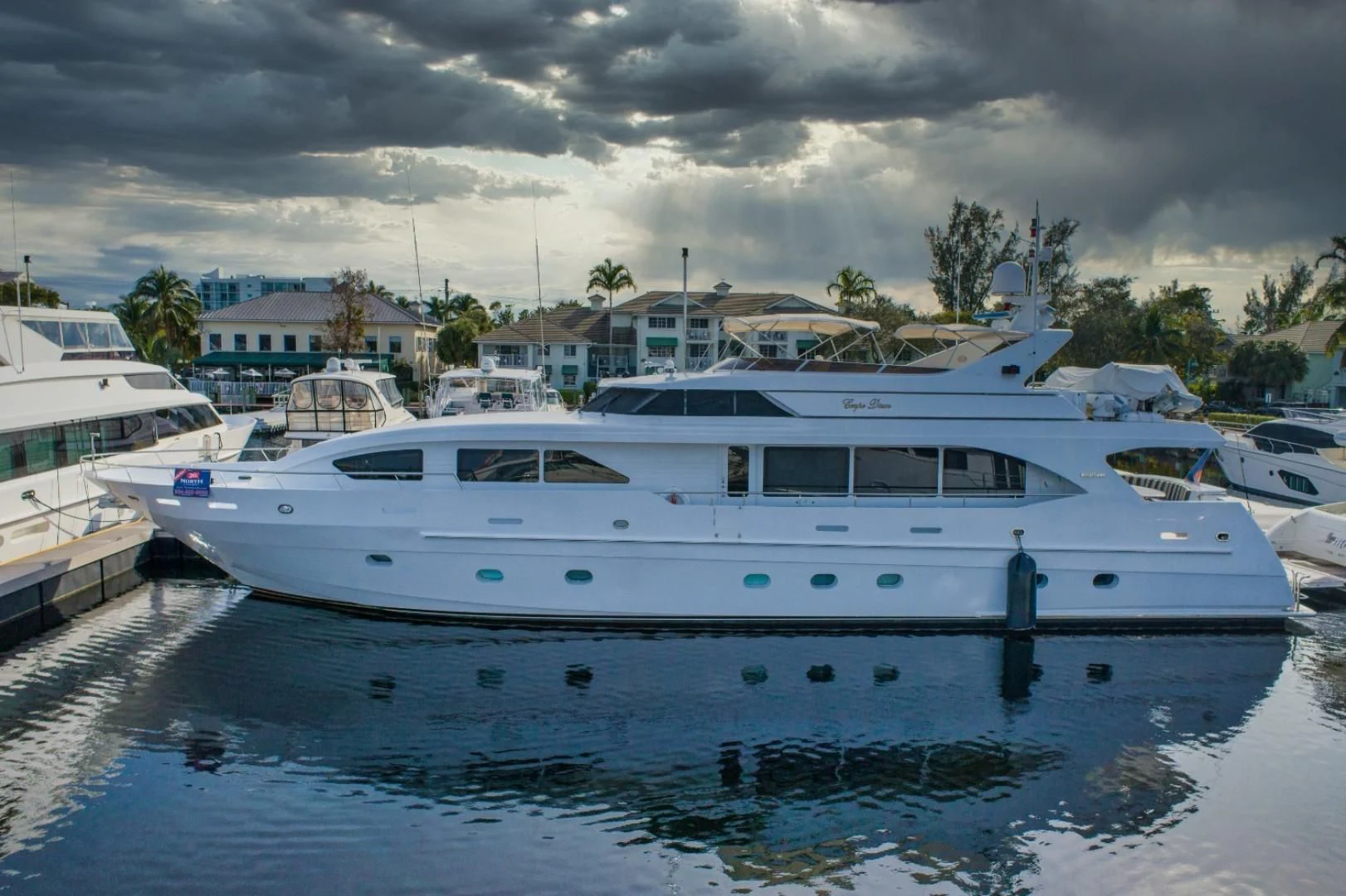 a group of boats in a harbor aboard CARPE DIEM Yacht for Charter