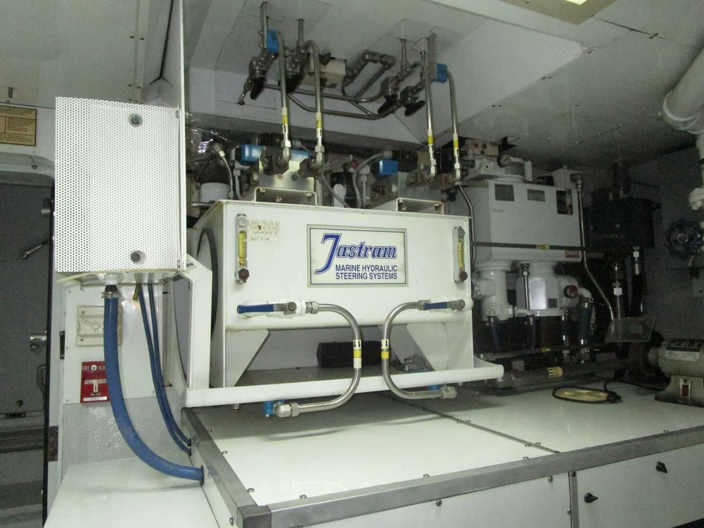 a white machine with a blue label aboard CARPE DIEM Yacht for Charter