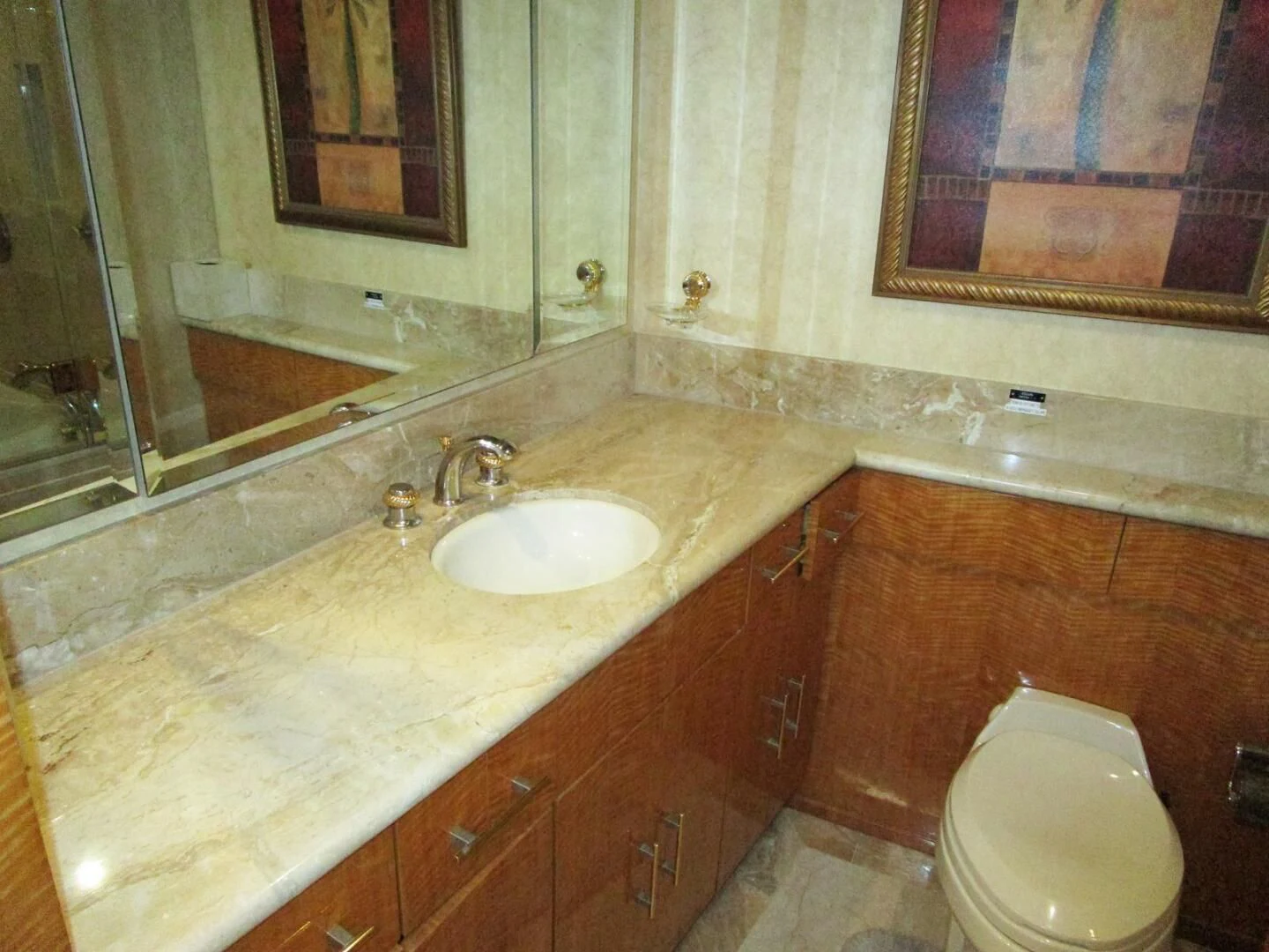 a bathroom with a marble counter top aboard CARPE DIEM Yacht for Charter