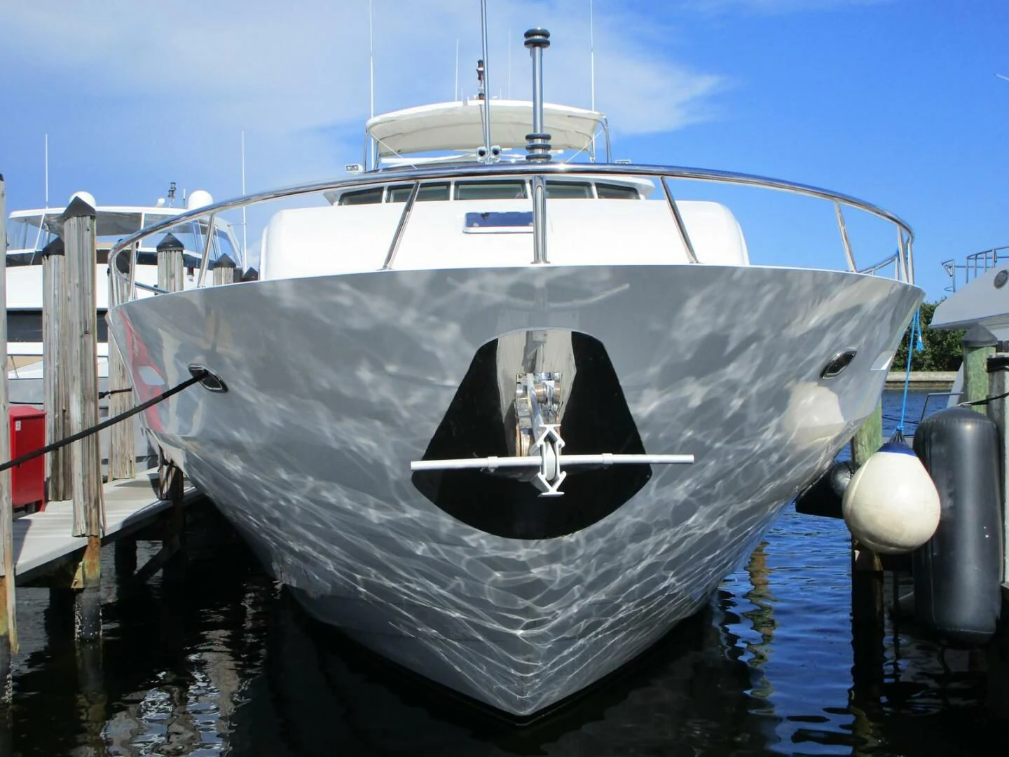 a boat docked at a pier aboard CARPE DIEM Yacht for Charter