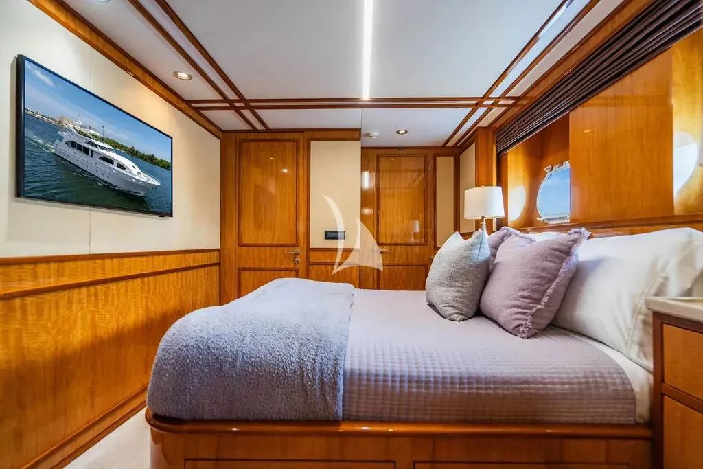 a bed with pillows and pillows aboard CARPE DIEM Yacht for Charter