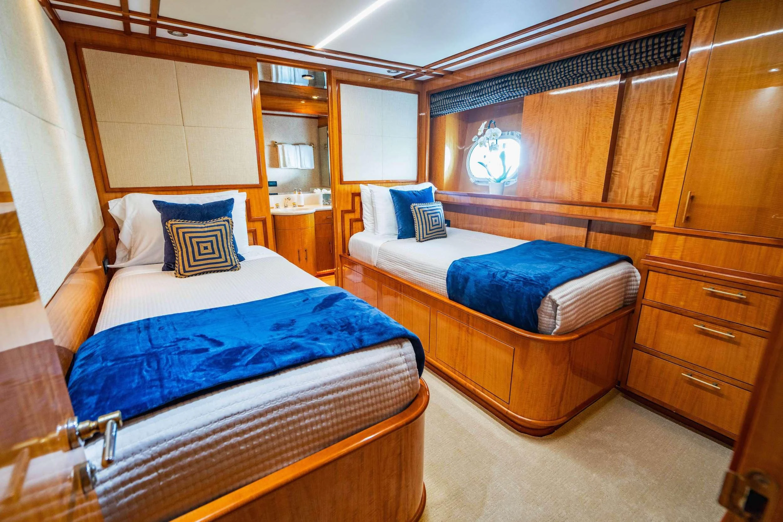 a room with two beds aboard CARPE DIEM Yacht for Charter
