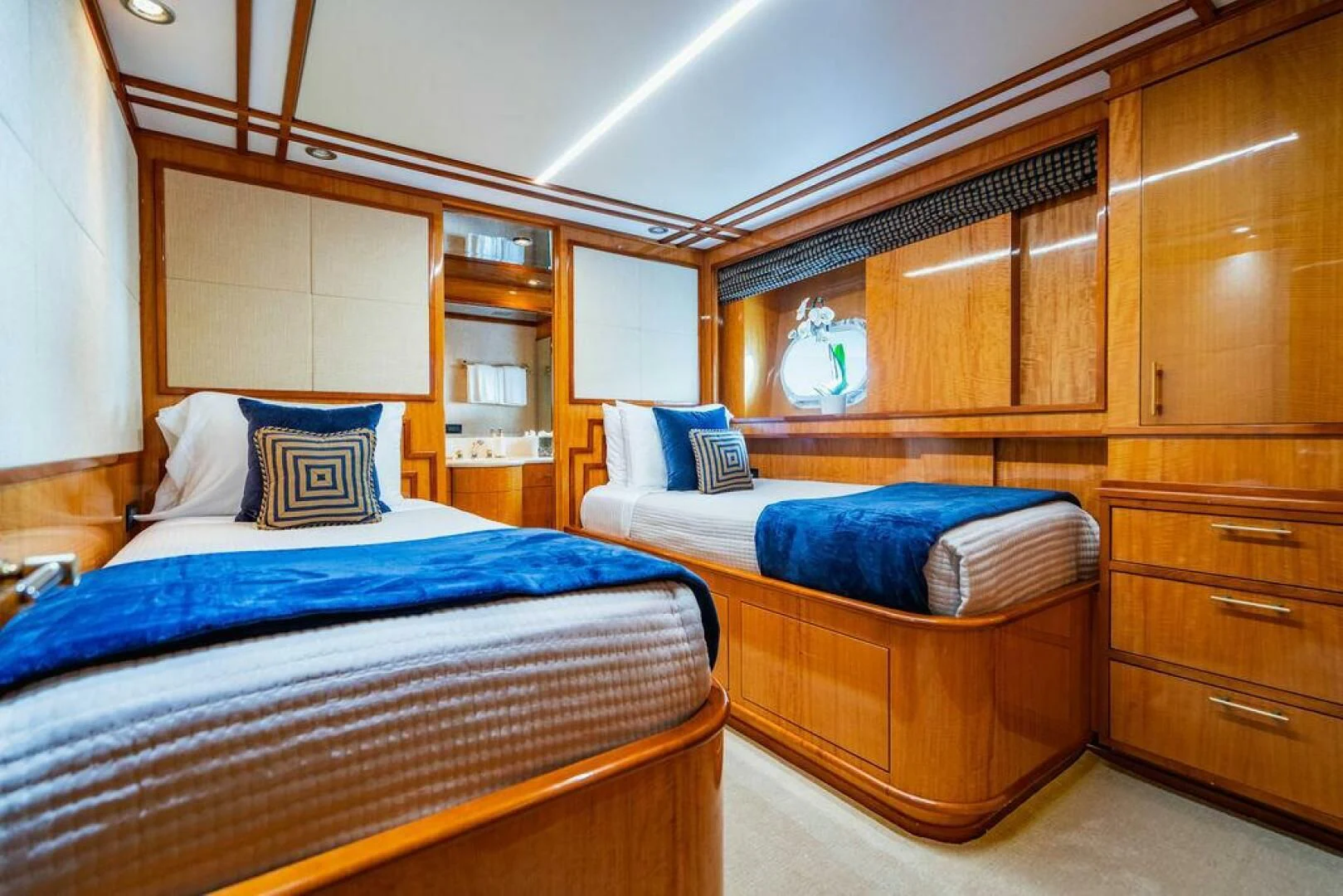 a couple of beds in a room aboard CARPE DIEM Yacht for Charter