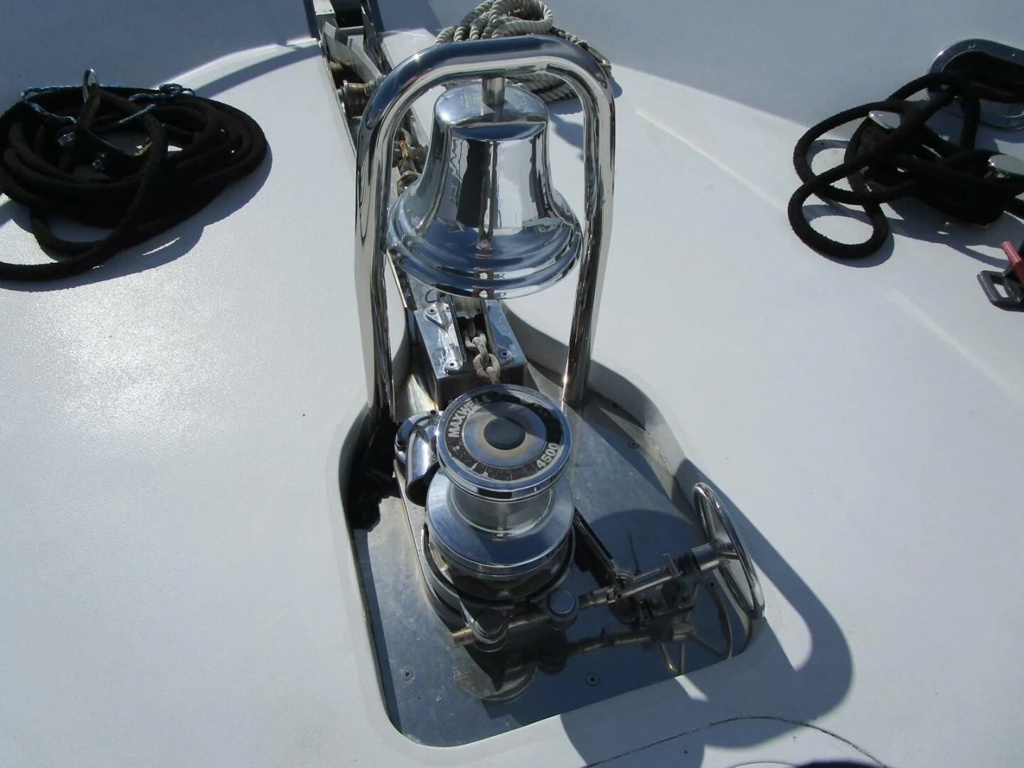 a shiny silver and black car engine aboard CARPE DIEM Yacht for Charter