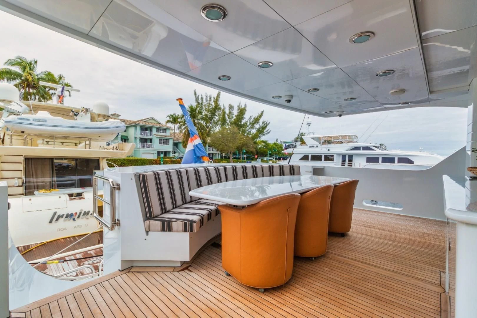 a room with a table and chairs aboard CARPE DIEM Yacht for Charter
