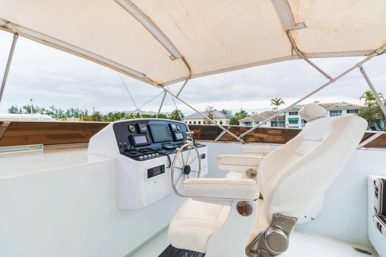a white car with a steering wheel aboard CARPE DIEM Yacht for Charter