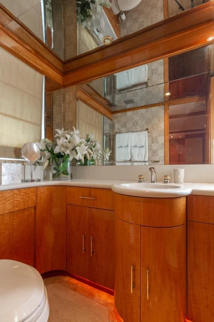a bathroom with a large mirror aboard CARPE DIEM Yacht for Charter