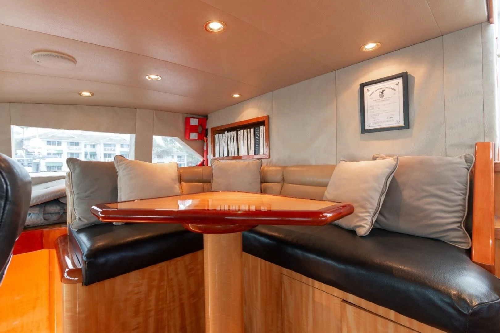 a living room with a couch and a table aboard CARPE DIEM Yacht for Charter