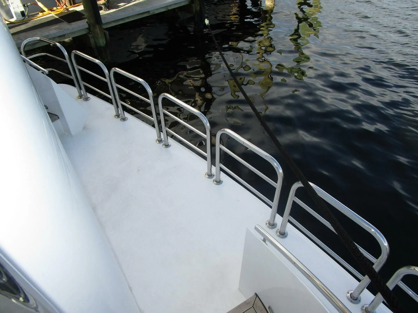a white boat on the water aboard CARPE DIEM Yacht for Charter