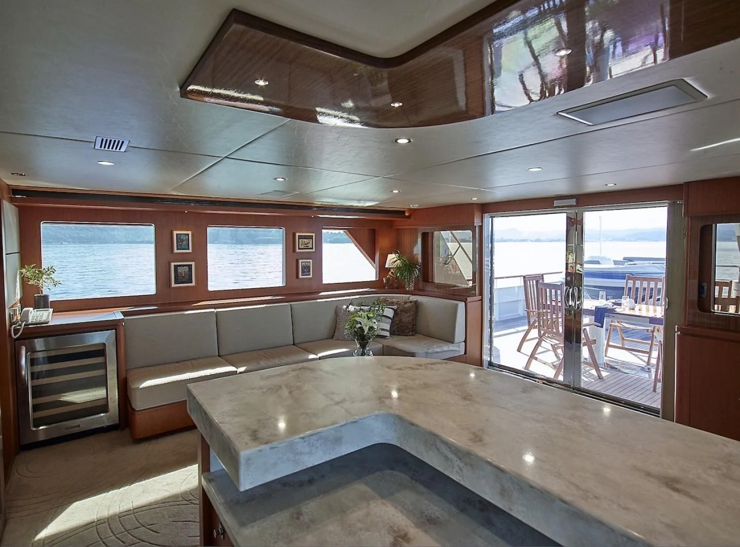 a large kitchen with a large island aboard ALAIA Yacht for Sale