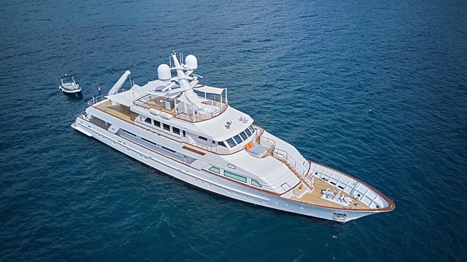 a large ship in the water aboard ALAIA Yacht for Sale