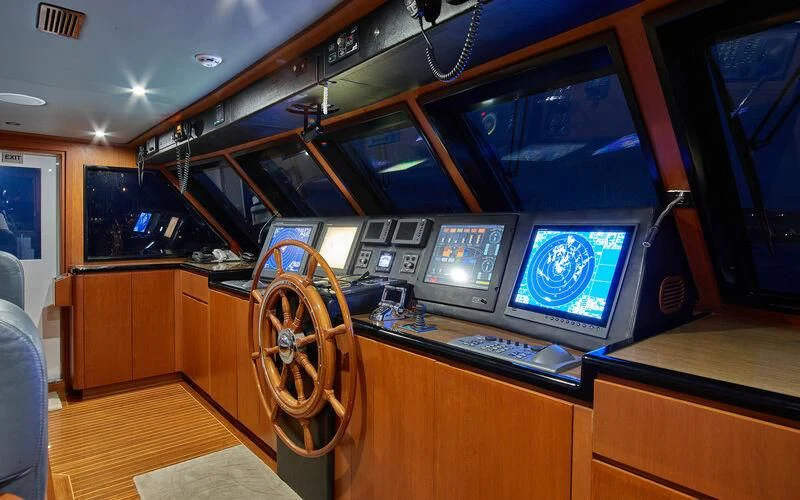 a room with a computer and a television aboard ALAIA Yacht for Sale