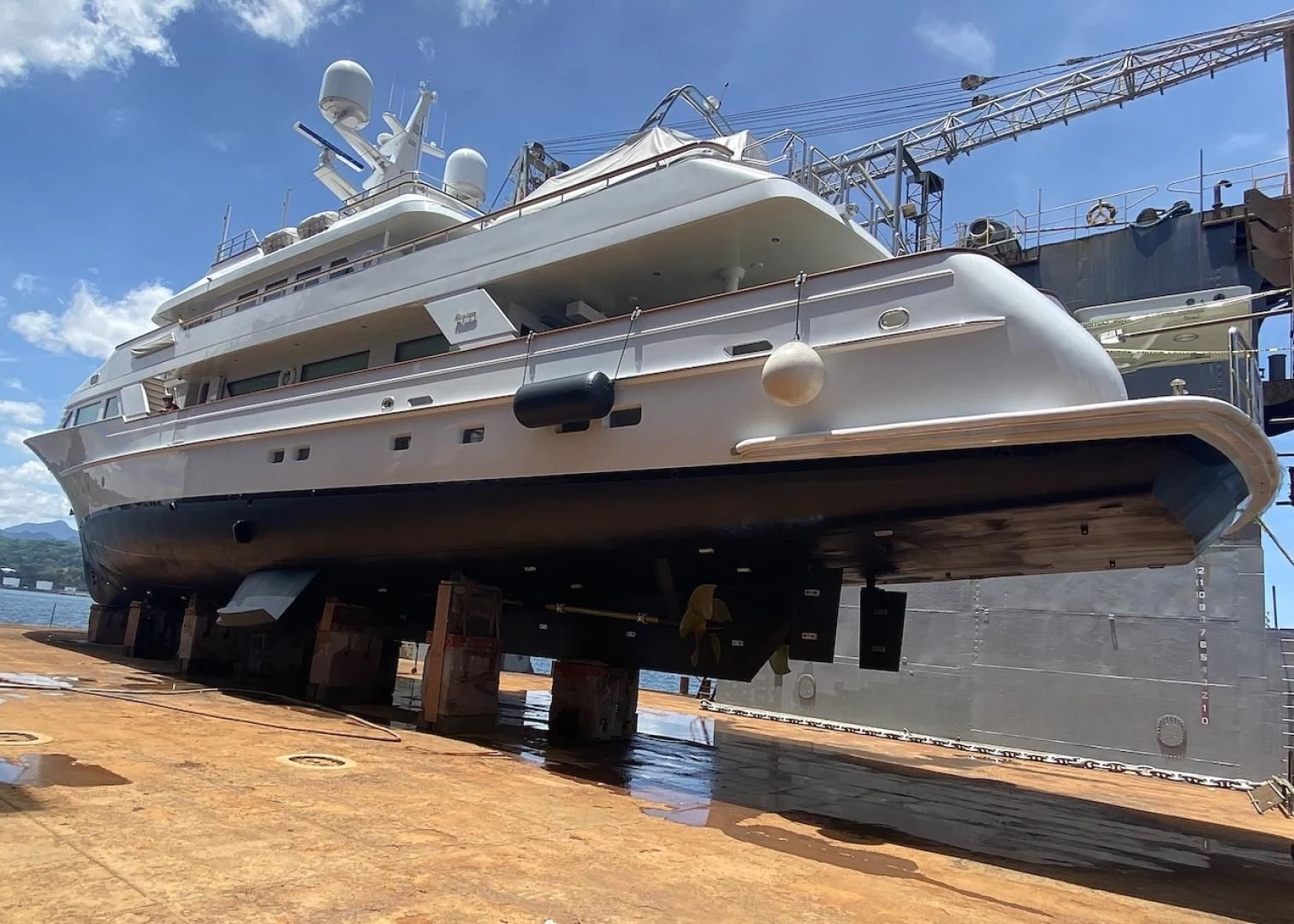 a large ship in a sandy area aboard ALAIA Yacht for Sale